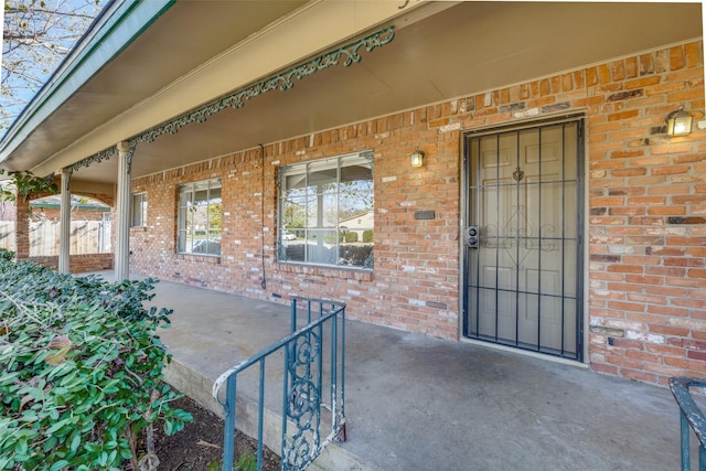 entrance to property with a porch