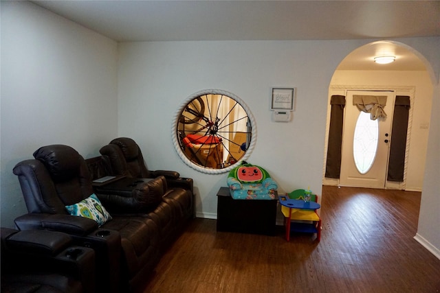 entryway with dark wood-type flooring