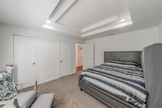 5613 Graham St, Sansom Park, TX 76114 - carpeted bedroom featuring a raised ceiling, recessed lighting, and baseboards