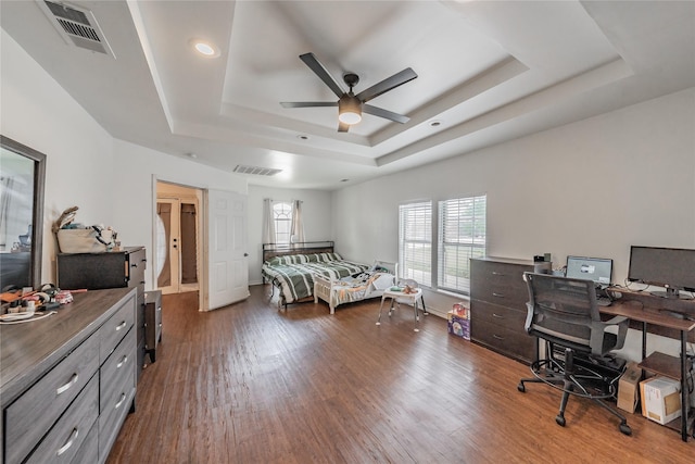 5613 Graham St, Sansom Park, TX 76114 - bedroom with a tray ceiling, wood finished floors, an office area, recessed lighting, and ceiling fan