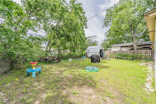 5613 Graham St, Sansom Park, TX 76114 - view of yard with a shed and an outbuilding