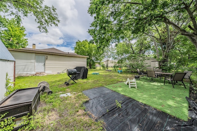 5613 Graham St, Sansom Park, TX 76114 - view of yard with a deck and outdoor dining area
