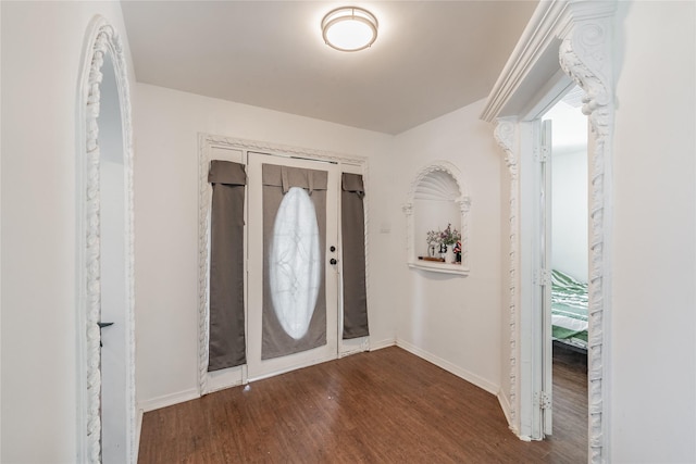 5613 Graham St, Sansom Park, TX 76114 - entryway featuring wood finished floors and baseboards