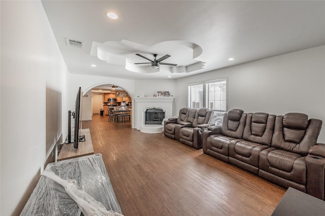 5613 Graham St, Sansom Park, TX 76114 - living room with a ceiling fan, arched walkways, recessed lighting, and wood finished floors