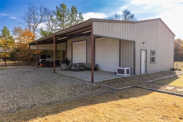 view of outbuilding with a garage