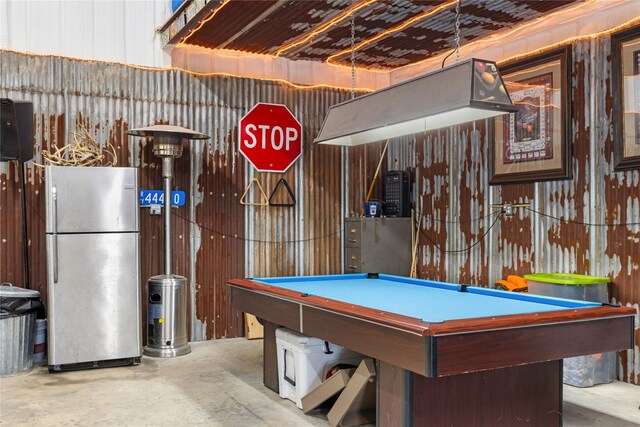 playroom featuring concrete floors and pool table