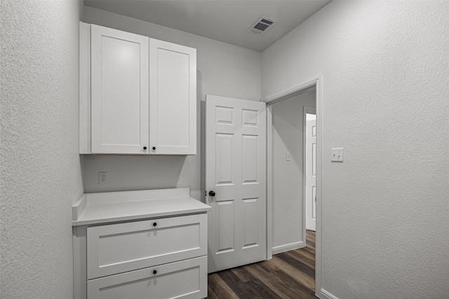 washroom featuring dark hardwood / wood-style flooring