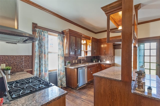 kitchen with sink, gas stovetop, ornamental molding, dishwasher, and island exhaust hood