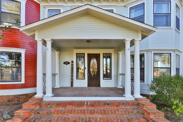 entrance to property with covered porch