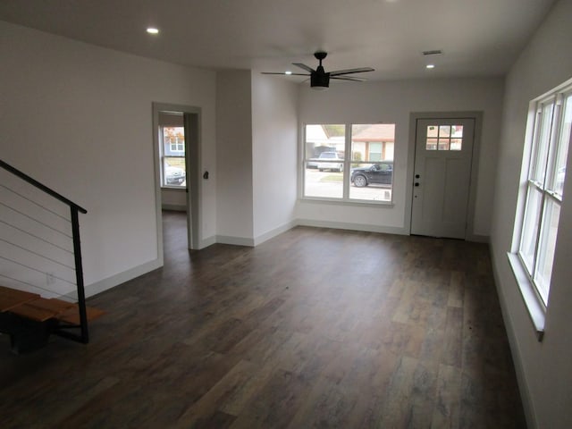 interior space featuring dark hardwood / wood-style flooring and ceiling fan