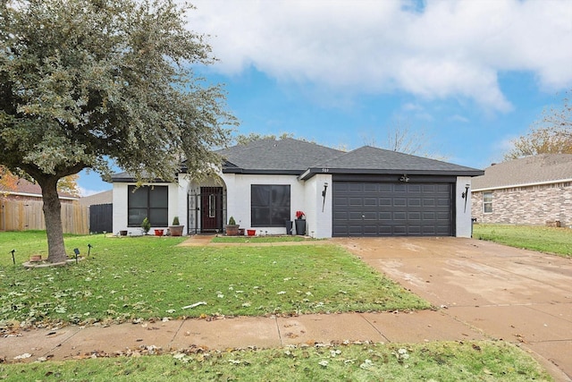 view of front facade featuring a garage and a front yard