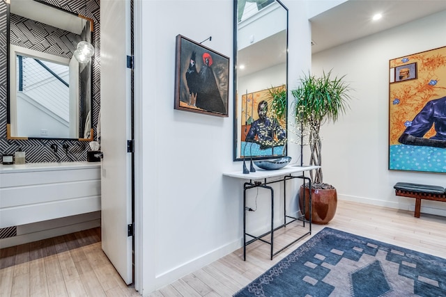 corridor featuring light hardwood / wood-style flooring