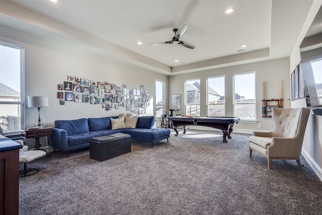 rec room with a tray ceiling, ceiling fan, carpet floors, and billiards