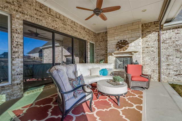 view of patio with outdoor lounge area and ceiling fan