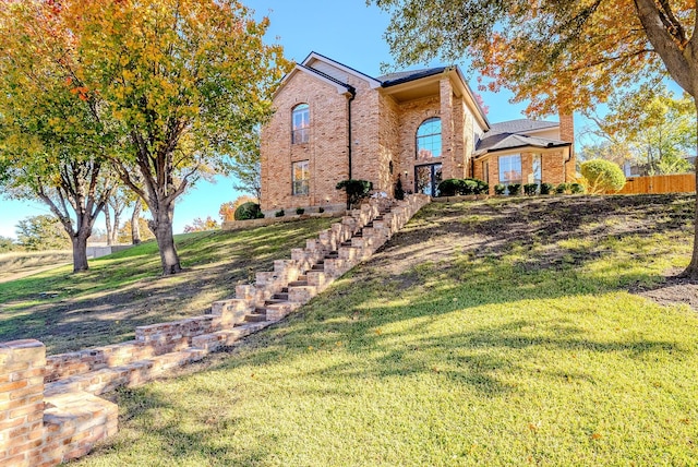 exterior space with a front lawn