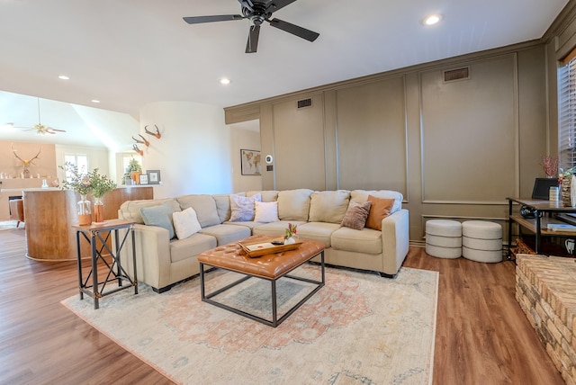 living room with light hardwood / wood-style floors