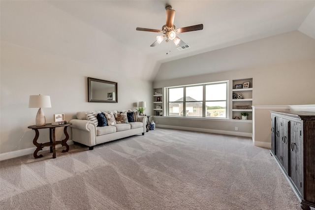 carpeted living room featuring ceiling fan, built in features, and vaulted ceiling