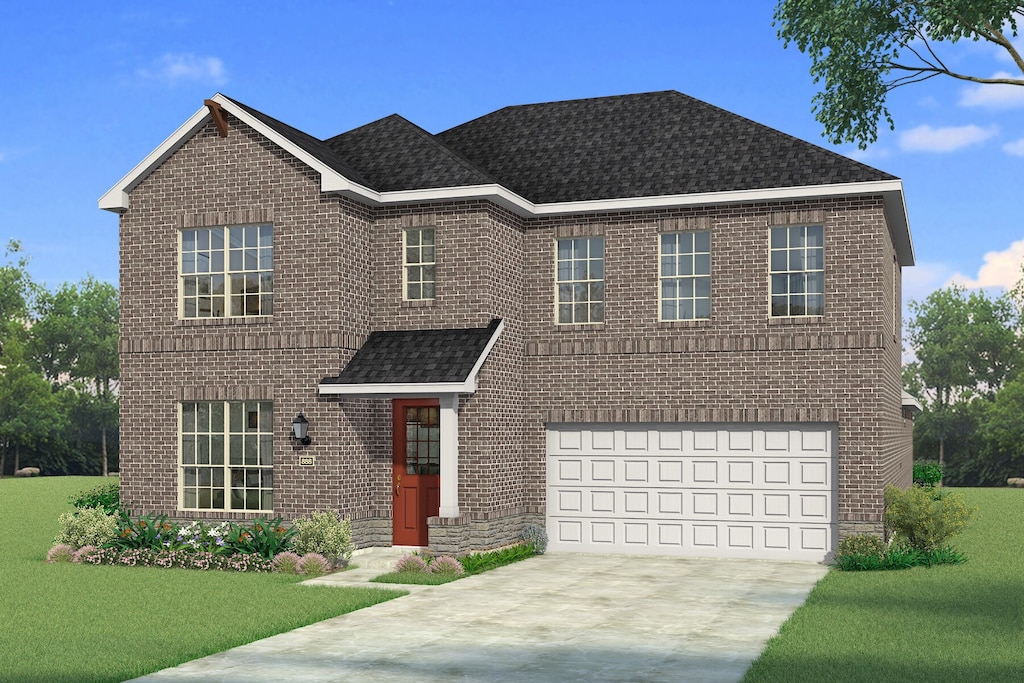 view of front facade featuring a garage and a front lawn