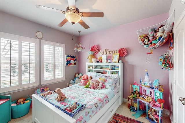 carpeted bedroom with ceiling fan