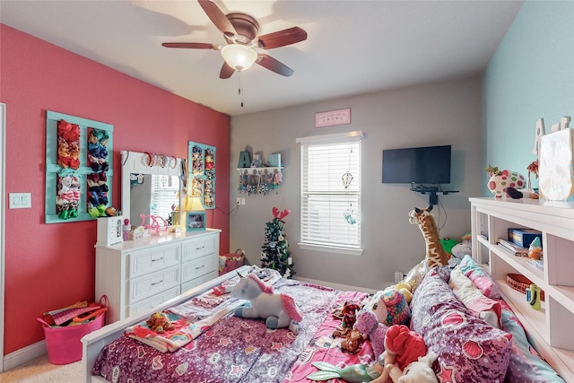 carpeted bedroom featuring ceiling fan