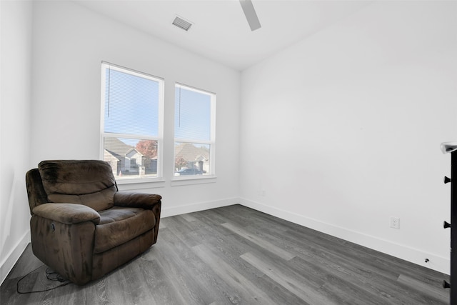 living area featuring hardwood / wood-style floors