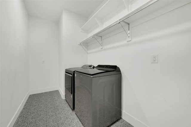 laundry room with washer and clothes dryer