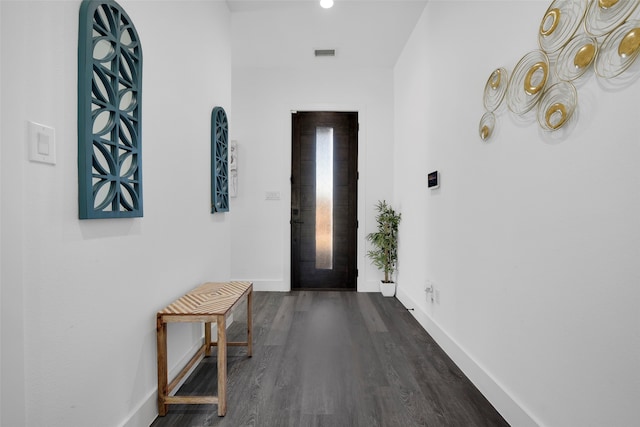 hallway featuring hardwood / wood-style flooring