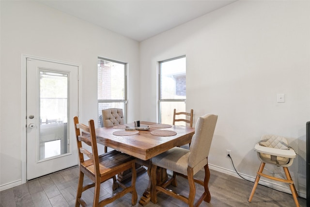 dining area featuring hardwood / wood-style floors