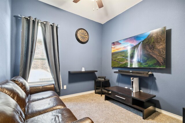 living room with carpet flooring and ceiling fan