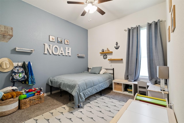 bedroom featuring light colored carpet and ceiling fan