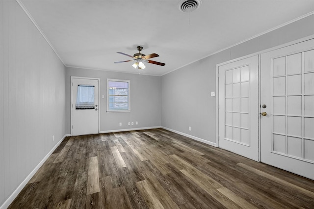 entryway featuring dark hardwood / wood-style floors, ceiling fan, and ornamental molding