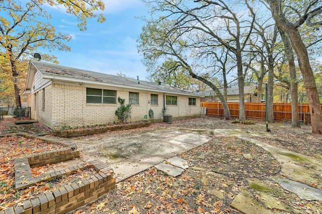 back of house featuring a patio area