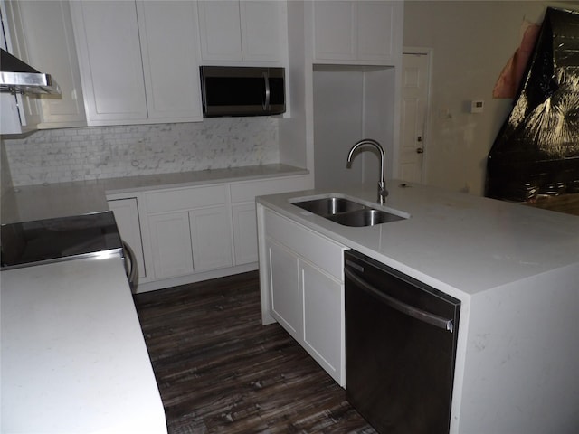 kitchen with sink, a center island with sink, black dishwasher, white cabinets, and backsplash