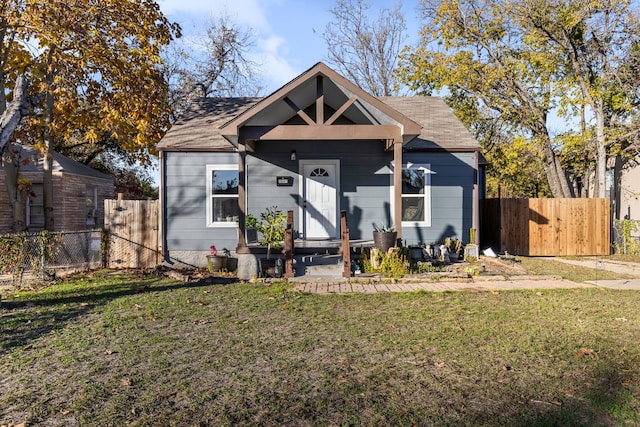 bungalow with a front lawn