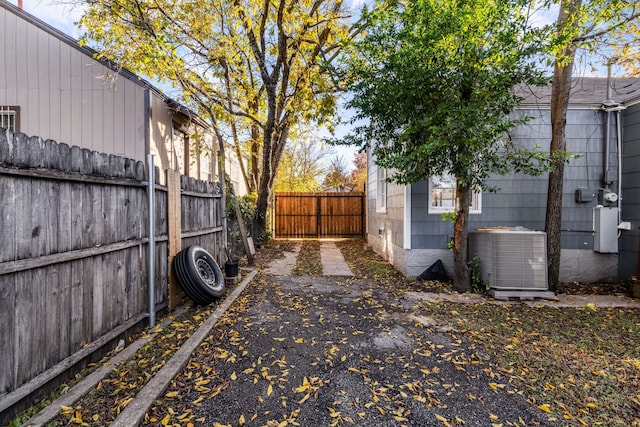 view of yard featuring central AC