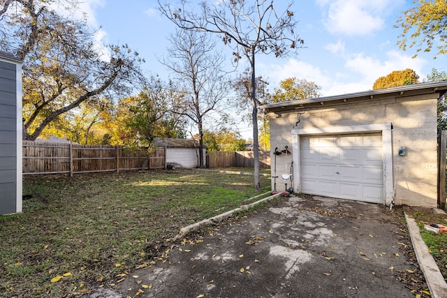 garage with a lawn