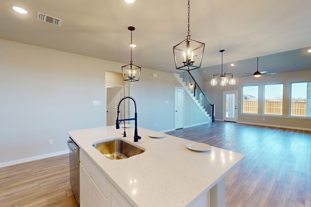 5000 Greenbrook Rd, Denton, TX 76226 - kitchen featuring a sink, light wood finished floors, baseboards, white cabinets, and recessed lighting