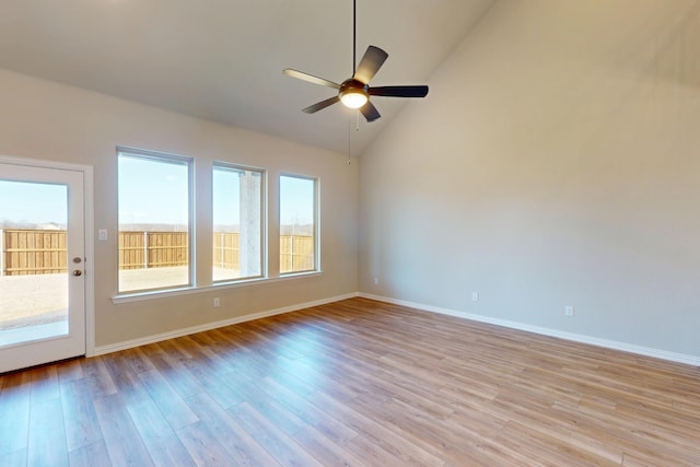 5000 Greenbrook Rd, Denton, TX 76226 - spare room with healthy amount of natural light, a ceiling fan, light wood-style flooring, vaulted ceiling, and baseboards