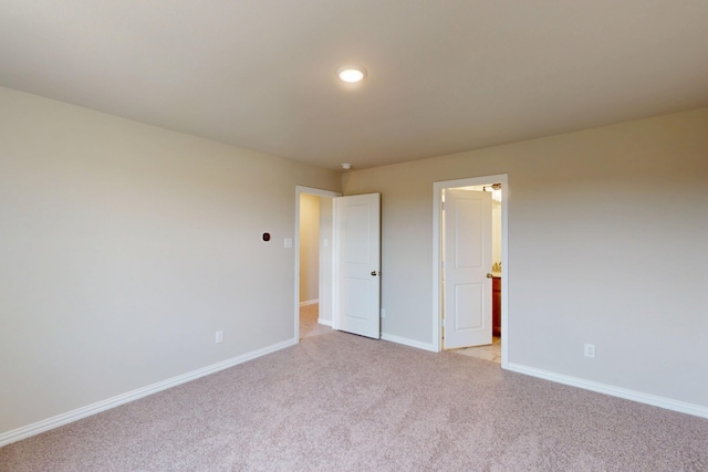 5000 Greenbrook Rd, Denton, TX 76226 - unfurnished bedroom featuring light carpet, baseboards, and recessed lighting