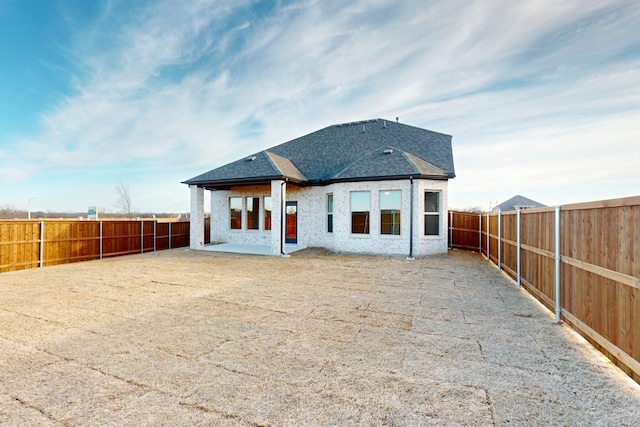 5000 Greenbrook Rd, Denton, TX 76226 - rear view of house featuring a patio area, a fenced backyard, and a shingled roof