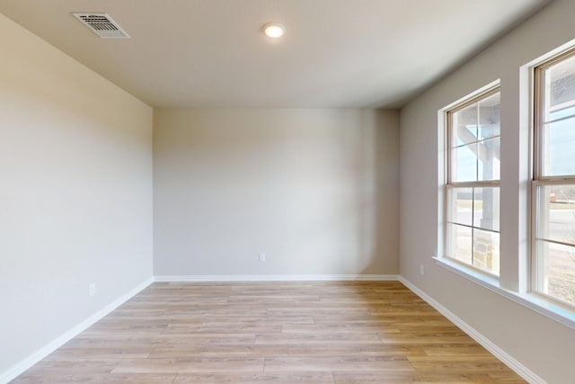 5000 Greenbrook Rd, Denton, TX 76226 - spare room with light wood-type flooring, baseboards, and recessed lighting
