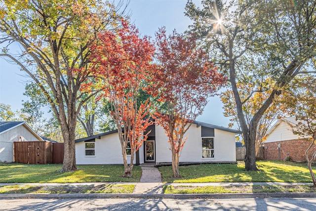 view of front of home with a front yard