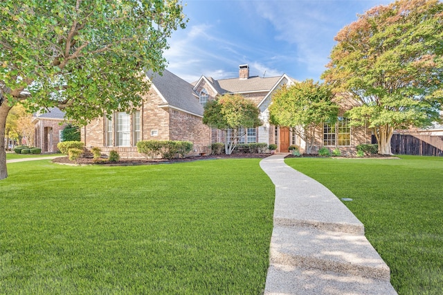 view of front of house with a front lawn