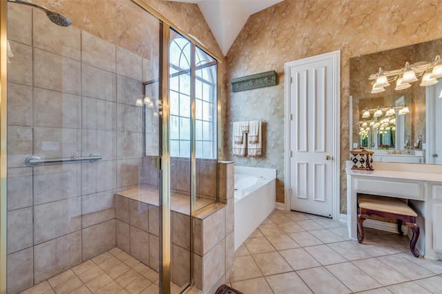 bathroom with tile patterned floors, separate shower and tub, and vanity