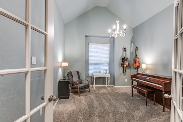 sitting room with an inviting chandelier, high vaulted ceiling, and carpet floors