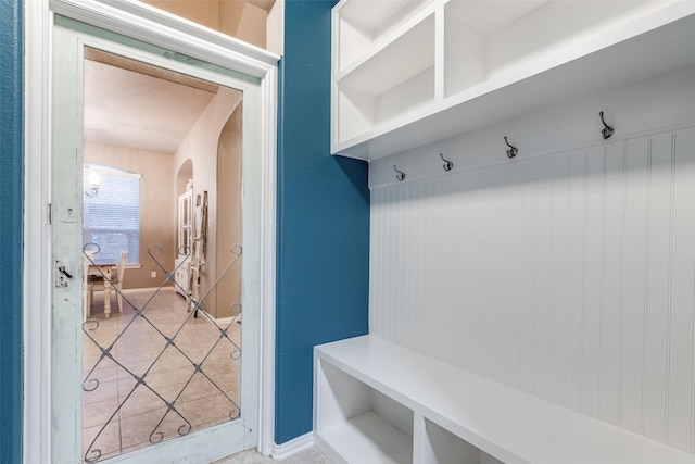 mudroom with light tile patterned flooring