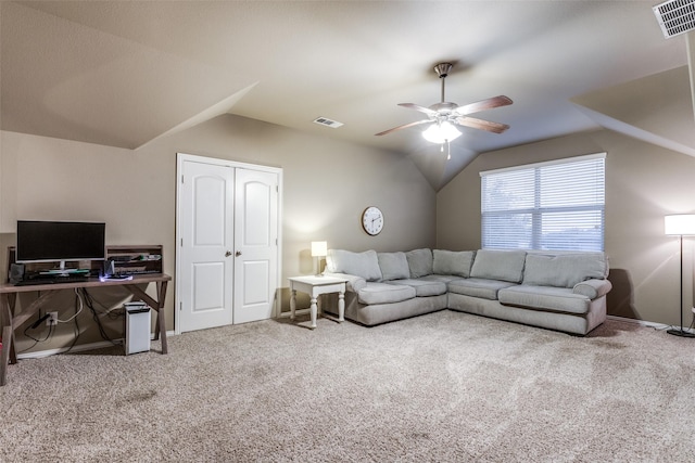 living room with lofted ceiling, carpet, and ceiling fan