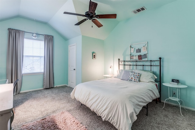 carpeted bedroom with ceiling fan and lofted ceiling