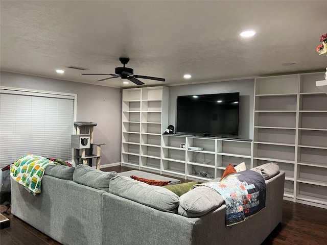 living room featuring dark hardwood / wood-style floors and ceiling fan