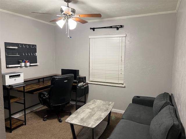 home office featuring carpet flooring, ceiling fan, and ornamental molding